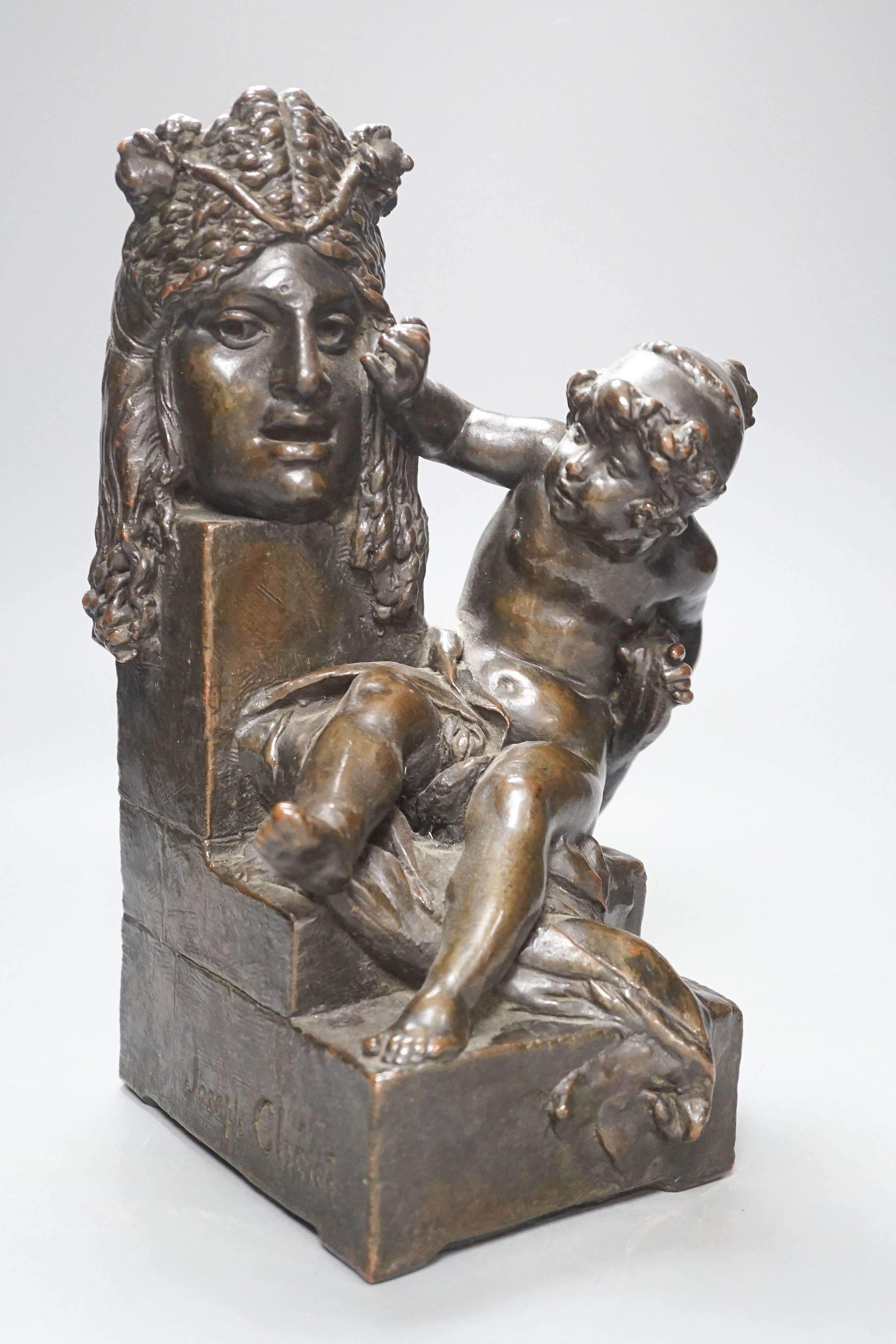 Gustave-Joseph Chéret (1838-1894). A bronzed terracotta group of putto beside a classical mask, signed, height 30cm